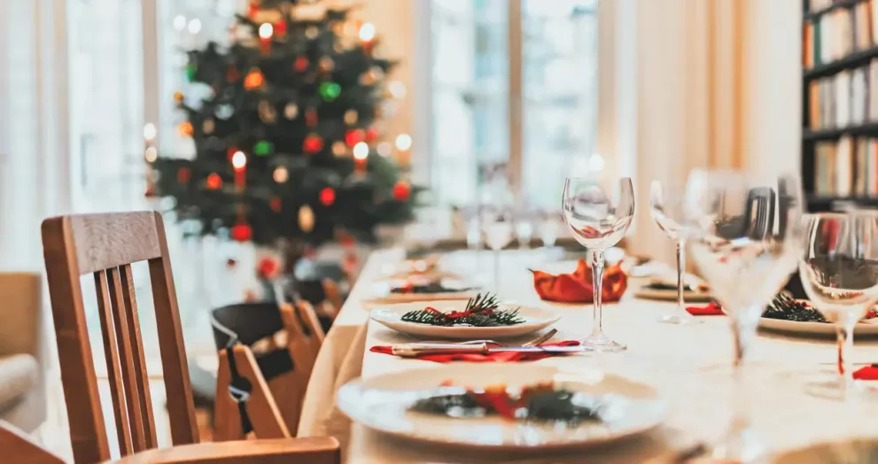 Friends and family enjoying a high-energy holiday party with structured activities and winter decorations