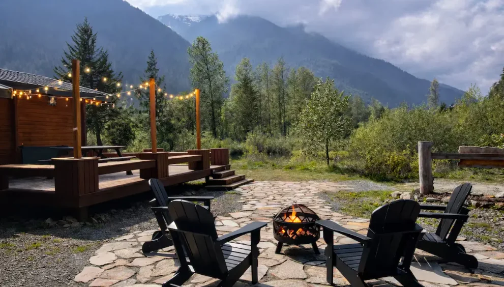 Families enjoying budget-friendly holiday gatherings in scenic mountainside locations with outdoor activities and festive decorations.