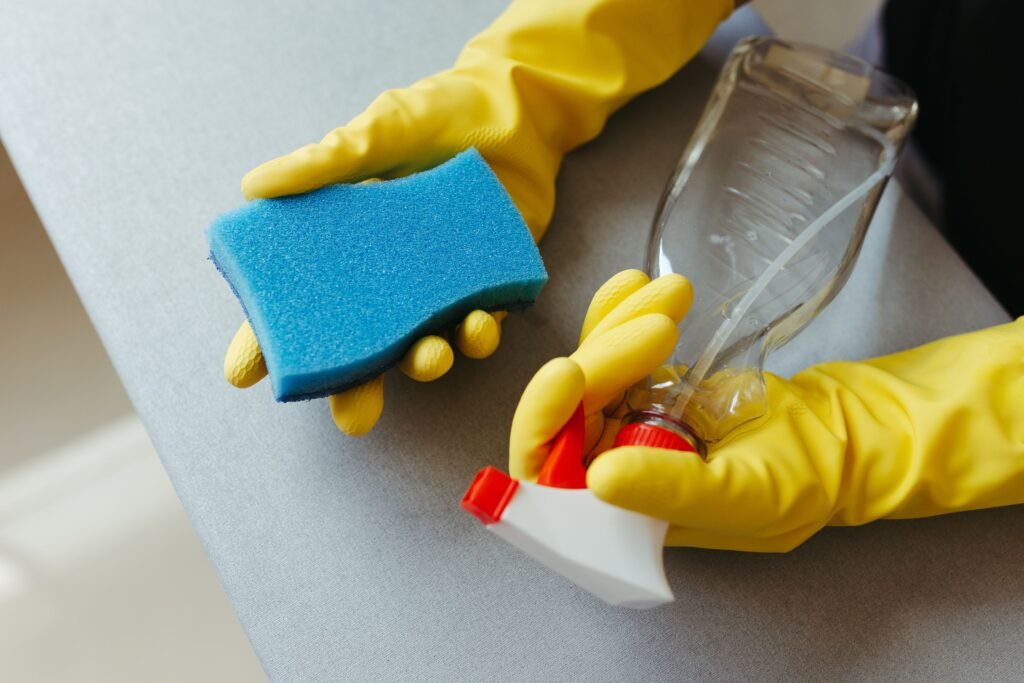 Supplies to clean shower mold in 2026 including white vinegar, hydrogen peroxide, baking soda and scrub brush – common US household items